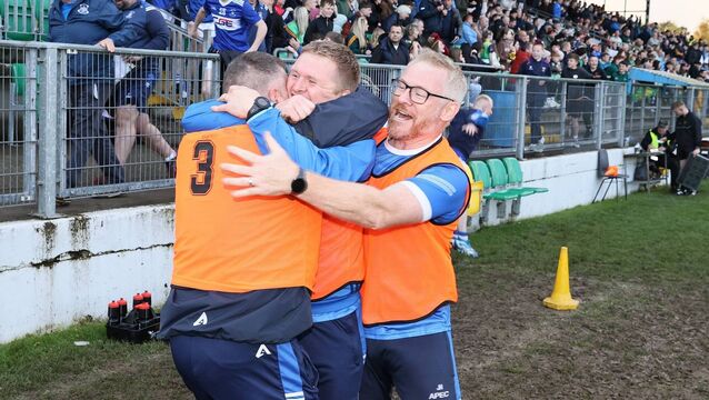 <p>Manager Brian Lonergan is mobbed after Old Leighlin's Senior Championship win in Carlow Photo: Pat Ahern</p>