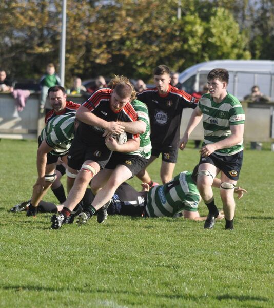 Stephen Walsh (Cill Dara) spins out of the tackle of Fiachra Tuckey (Balbriggan). Stephen Walsh (Cill Dara) spins out of the tackle of Fiachra Tuckey (Balbriggan).