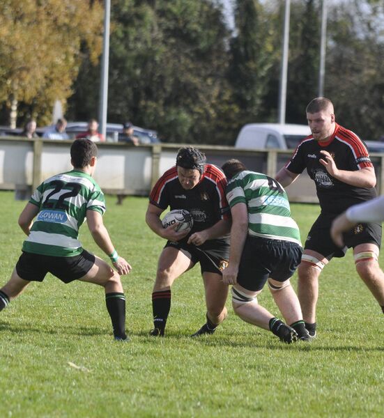 Sean Behan (Cill Dara) breaks the Tackle of Adam O'Connor (Balbriggan). Sean Behan (Cill Dara) breaks the Tackle of Adam O'Connor (Balbriggan).