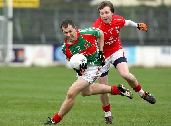 Current Athy joint manager Ross Bell tackles Garrycastle's Dessie Dolan during the 2011 Leinster semi-final Photo: ©INPHO/Ryan Byrne Current Athy joint manager Ross Bell tackles Garrycastle's Dessie Dolan during the 2011 Leinster semi-final Photo: ©INPHO/Ryan Byrne