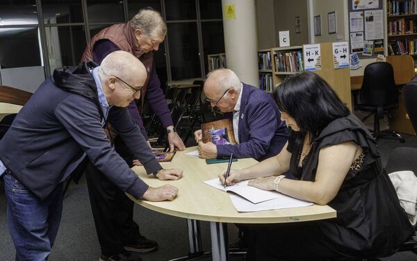 John MacKenna and Faye Tucker sign copies of John's book for Jim Fitzharris and Dermot O'Leary John MacKenna and Faye Tucker sign copies of John's book for Jim Fitzharris and Dermot O'Leary