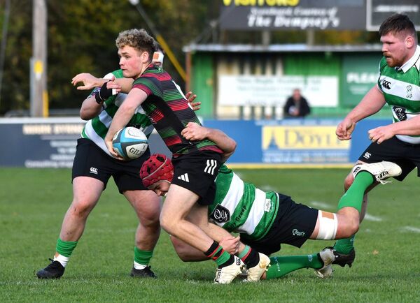 Naas captain Will O'Brien puts in a fine tackle on Highfield's James Brugger. All Photos: Michael Anderson Naas captain Will O'Brien puts in a fine tackle on Highfield's James Brugger. All Photos: Michael Anderson