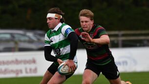 <p>Tom Monaghan off loads for Naas as they attack the try line.</p> <p>Tom Monaghan off loads for Naas as they attack the try line.</p>