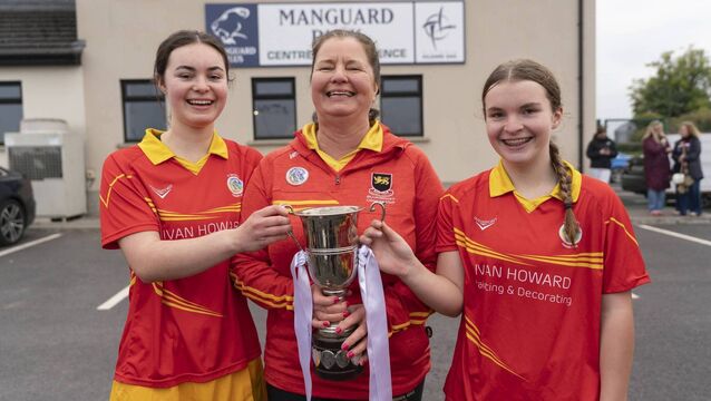 <p>St Laurences and Kildare camogie legend Mel Treacy with her nieces Reiltin and Grace Nolan after their recent Intermediate Championship win Photo: Aisling Hyland</p>