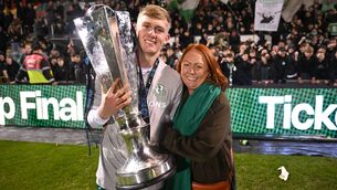<p>Michael Noonan of Shamrock Rovers and his mother Sandie celebrate with the trophy after the SSE Airtricity Men's Premier Division match between Shamrock Rovers and Sligo Rovers at Tallaght Stadium in Dublin. Photo: Stephen McCarthy/Sportsfile</p>