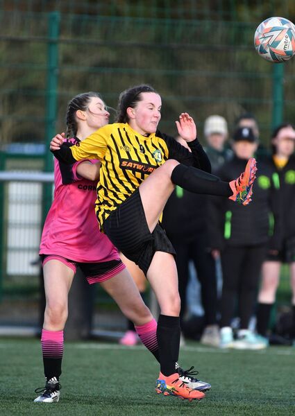 Brianne Kaye (Monasterevin) flicks the ball under pressure from Jemma Farrell (Derry Rovers) Brianne Kaye (Monasterevin) flicks the ball under pressure from Jemma Farrell (Derry Rovers)
