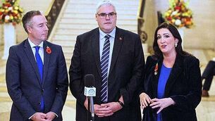 Bid to force North's education minister Givan from office over Israel trip fails