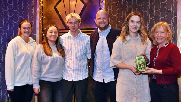 Bridget Ryan presents the award to the Little Brew team