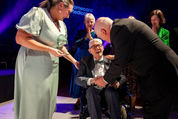 Jimmy been congratulated by Tadgh Daly of Nursing Home Ireland Jimmy been congratulated by Tadgh Daly of Nursing Home Ireland