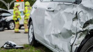 <p>Close up on a car crashed during an accident with two firemen in background with firetruck during a day of summer</p> <p>Close up on a car crashed during an accident with two firemen in background with firetruck during a day of summer</p>
