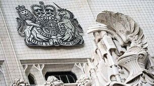 Two men arrested in connection with attempted murder of Detective John Caldwell