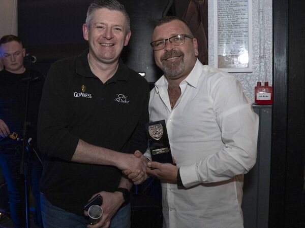 Brendan Kelly presents Danny Carthy with Best Tribute Act Brendan Kelly presents Danny Carthy with Best Tribute Act