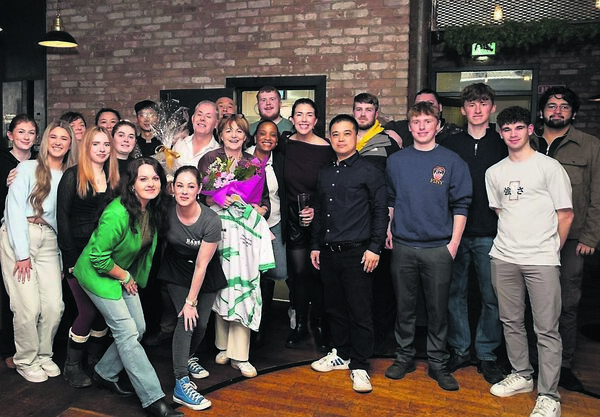 The staff of Horan’s Bar, Baltinglass, present Eamon and Maree with farewell gifts as the couple retire from the pub trade