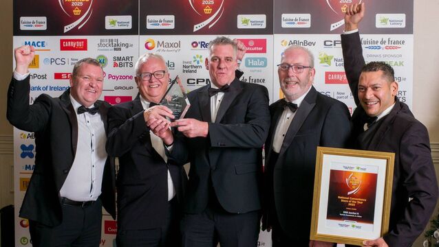 <p> Kevin Fitzgerald, Head of Field Sales, Aryzta, and Jim O’Connor, National Sales Manager, National Lottery presenting the award for National Convenience Store of the Year (Overall Winner) to Alex DuPreez, Donal Fitzpatrick and Eduardo Galeno, SPAR Junction 14 Mayfield.</p>