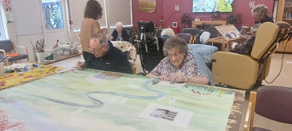 Michael Kelly and Helen Bradley working on the art work Photo Nicola Fitzpatrick