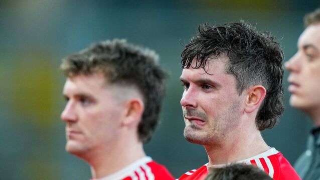 <p>Athy captain David Hyland dejected after the final whistle Photo: ©INPHO/James Lawlor</p>