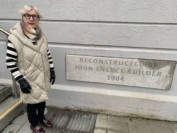 Cllr Anne Breen at the restored commemorative plaque on the front of the new Town Hall in Naas. Cllr Anne Breen at the restored commemorative plaque on the front of the new Town Hall in Naas.