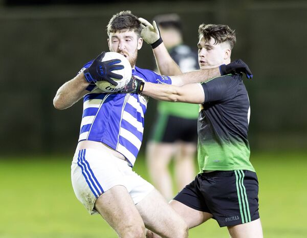 Naas's Sean Hanafin battles Balyna's Shane Flynn. All Photos: Sean Brilly Naas's Sean Hanafin battles Balyna's Shane Flynn. All Photos: Sean Brilly