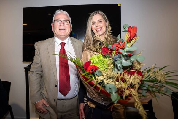 County board Chairman Mick Mullen presents outgoing Secretary Christine Murray with a bouquet of flowers County board Chairman Mick Mullen presents outgoing Secretary Christine Murray with a bouquet of flowers