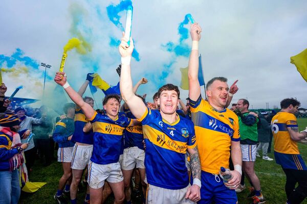 Lee Doyle leads the Grangenolvin celebrations after winning the 2025 Leinster Club Junior Football Championship final.