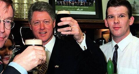 White House did not want photo of Clinton shaking Adams’ hand during 1995 visit