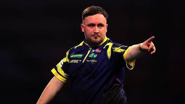 ‘Settled’ world champion Luke Littler wastes little time beating Mensur Suljovic