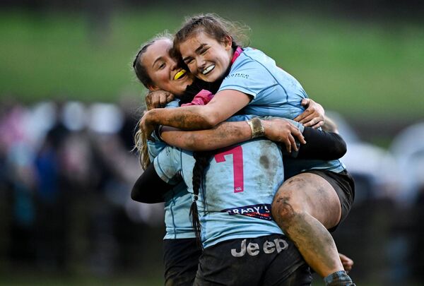 Abby Healy who scored a phenomenal 30 points in the final, celebrates with Prudence Isaac and Emma Brogan.