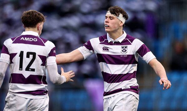  Philip Kenny celebrates after a try for Clongowes Wood Photo: ©INPHO/Andrew Conan