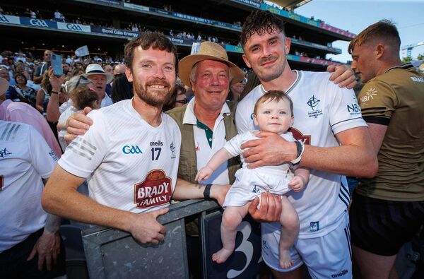 David Hyland celebrating with his brother Ray, father Ray and nephew Paidi after the 2025 Tailteann Cup win over Limerick Photo: ©INPHO/Ryan Byrne