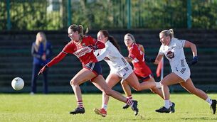 <p>Gillian Wheeler and Lisa Shaw try to win possession for Kildare from Aoife Healy of Cork in the National Football League Division 1, Round 1, at MTU, Cork. Photo: Jim Coughlan.</p>