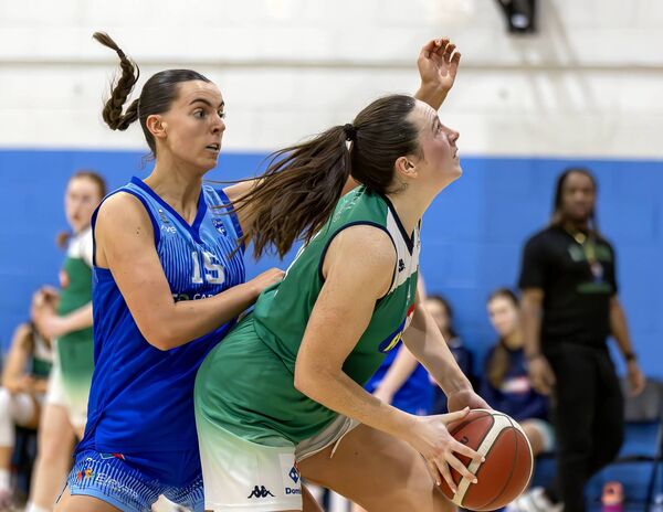 Liffey Celtics' Aine O'Connor holds off Emer Dunne of UCC Glenmire.