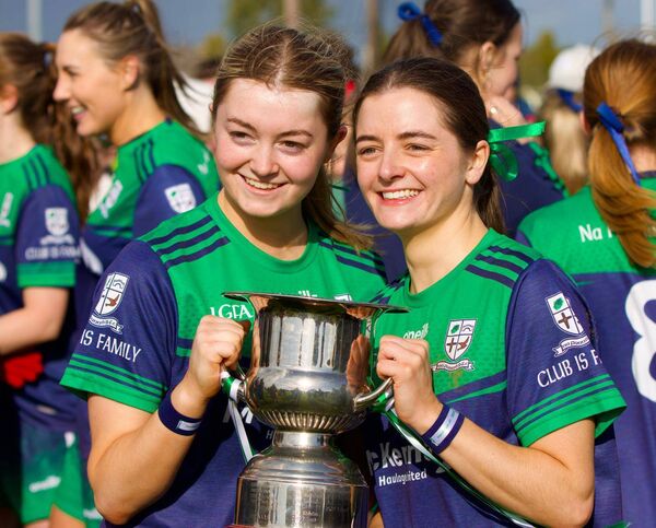 Liadan and Doireann Peelo Dennehy celebrate with the trophy.