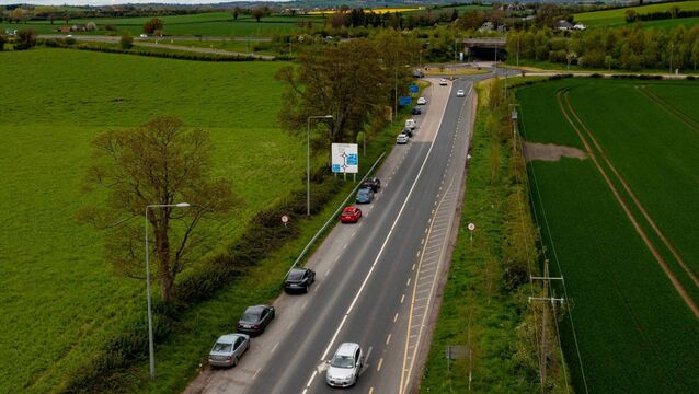 <p>Cars parked near roundabout on R448 near Prumplestown Cross off junction 4. Photo: michaelorourkephotography.ie</p>
