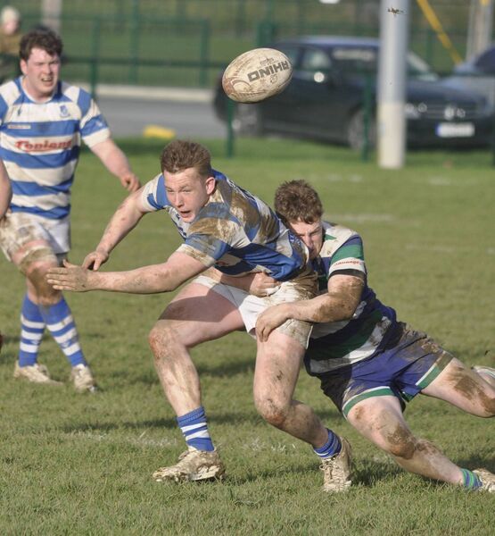 Jack Henry offloads as he is tackled by Ponamu Palazzetti.