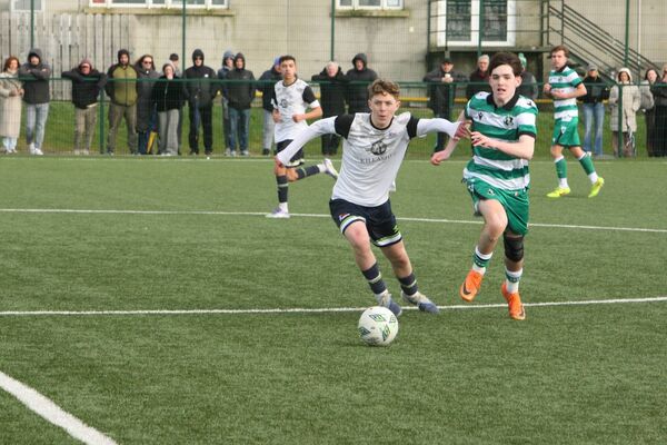 Fionn Kirby in a race foe the ball against Shamrock Rovers Fionn Kirby in a race foe the ball against Shamrock Rovers