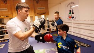Young boxer wins the chance to train with Olympians
