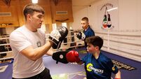 Young boxer wins the chance to train with Olympians