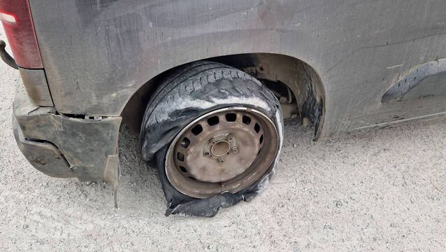 <p>The tyre on the back of a Peugeot van. Photo courtesy of gardaí</p>