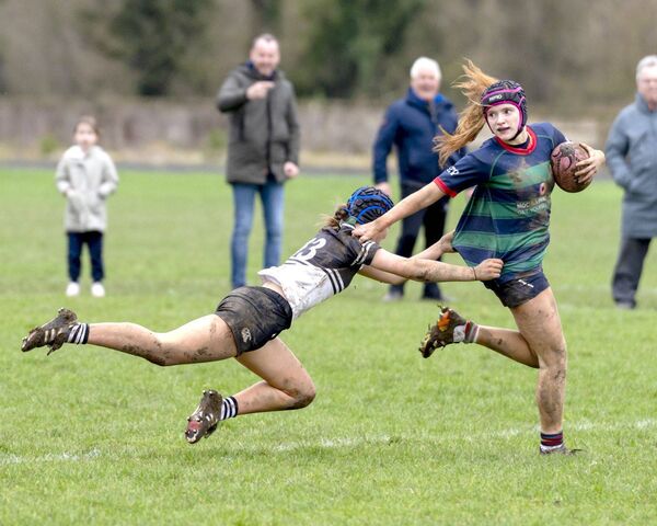 Newbridge's Jules Flanagan raced back to stop Aoibheann Conroy from scoring a spectacular try.