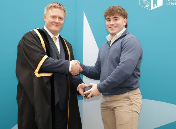 Former CBS Naas, Meánscoil Iognáid Rís student Harry Dunne receiving the scholarship