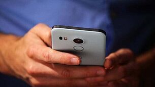 Gerry Adams arrives at High Court for bombings trial