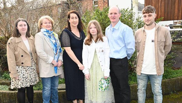 Confirmation from St Evin's school at girls Ava Phillips and family 