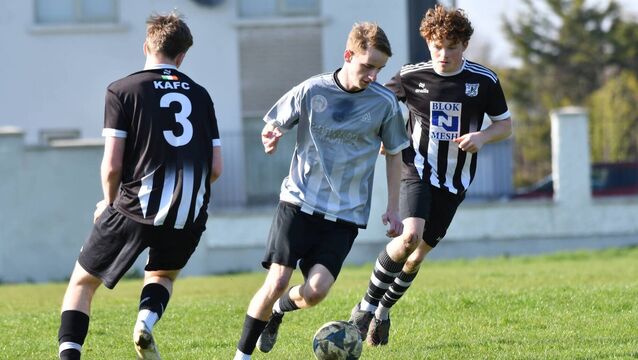 Eight-man Coill Dubh make things difficult for league champions