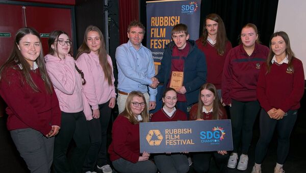 Richard Curtin of Kildare Co. Co. presents the ‘Impact’ Award to students from Coláiste Lorcáin, Castledermot for their film titled ‘The Truth is ‘Plane’ to See’ 