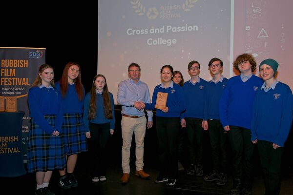 Richard Curtin presents the ‘Best Poster’ Award to students from Cross &amp; Passion College, Kilcullen
