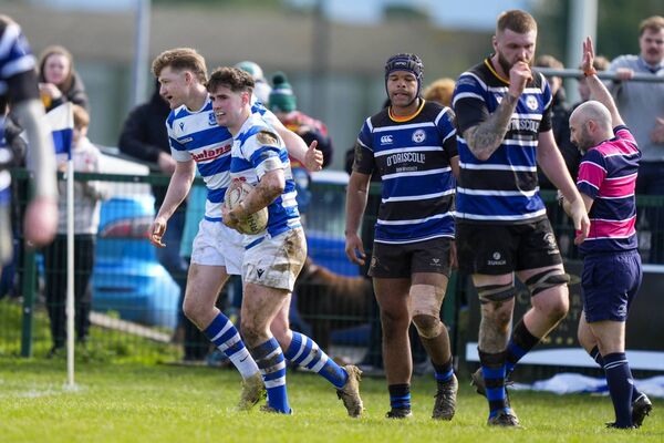 Culann Carbery celebrates scoring Athy's first try of the game.