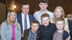 <p>Sam McKnight and family</p>