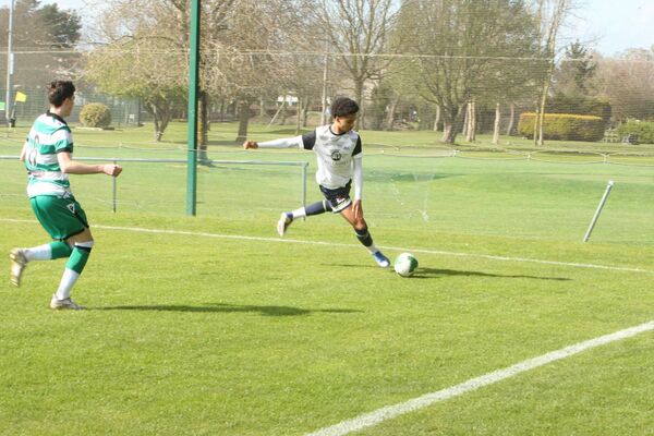 Carlson Sadilua clears the ball for Klub Kildare