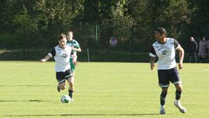 <p>Ethan Deegan and Jaydon Parson on the attack for Klub Kildare</p>
