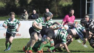 <p>Ryan Casey controlling things for Naas as he breaks away from the scrum</p>